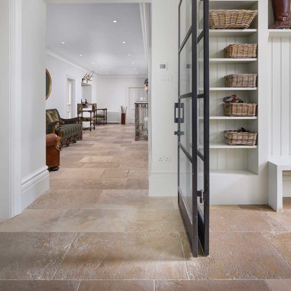 Antiqued French limestone flooring