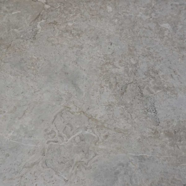 Light grey marble tiles for walls and floors