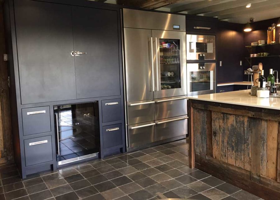 Case study Stone flooring perfect for a navy blue kitchen Natural