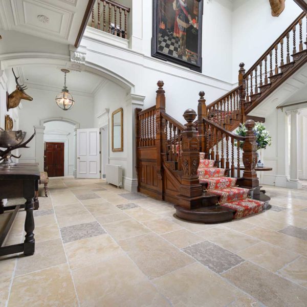 Barr rendition antiqued limestone grand hallway