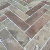 reclaimed terracotta parquet flooring