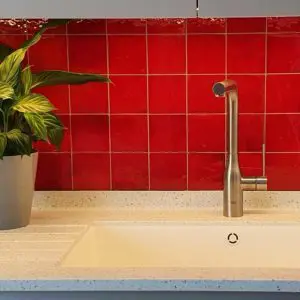 Red Zellige tiles splashback