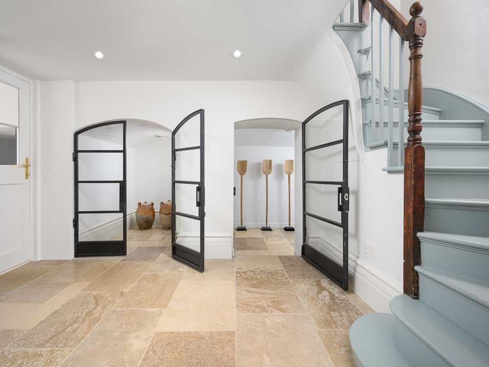 Antiqued french limestone hallway flooring
