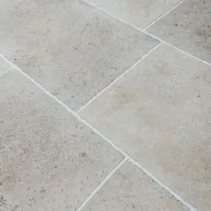 French white antiqued limestone floor