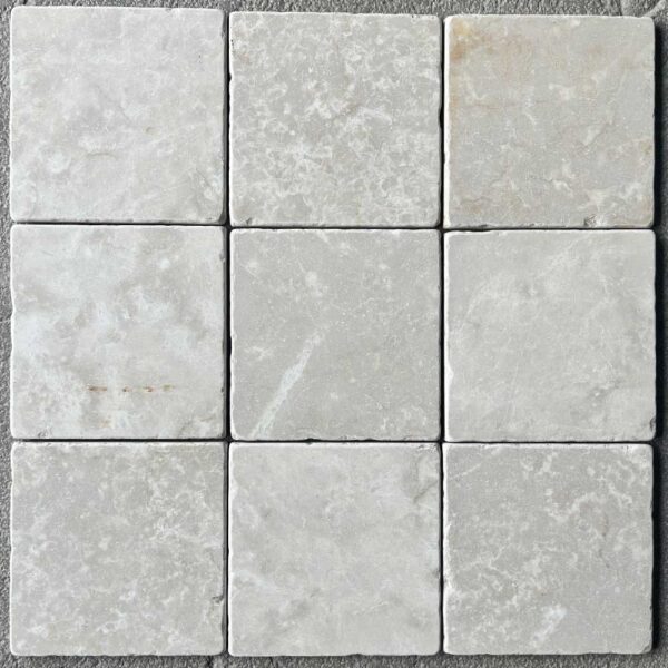 Cream tumbled marble tiles
