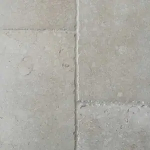 Cream aged flagstone flooring