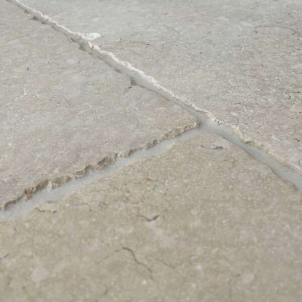 White rustic limestone floor