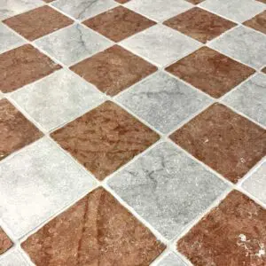 Verona Rosso and Carrara tumbled marble checkered floor